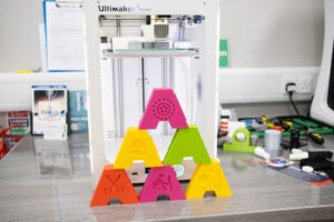 3d printing machine with colourful printed items